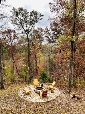 Fire pit where smores and ghost stories are shared