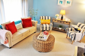 Cozy living room for the family. Bright airy feel.