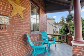 Feel on the pulse of the neighborhood while sitting on the front porch.