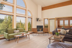 Bright and sunny family room with expansive views of Byers Peak