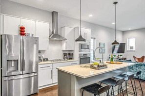 The kitchen is spacious and great for preparing your favorite meals.
