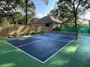 No Waiting at the Park, this court is just 50-ft from the house, shaded by trees