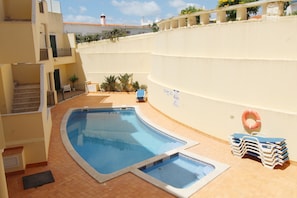 Shared pools with surrounding terrace