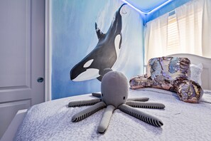 Adorable ocean themed 2 twin beds with flat screen TV