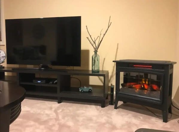 55" Smart Samsung TV w/ Netflix
Electric Fireplace Heater