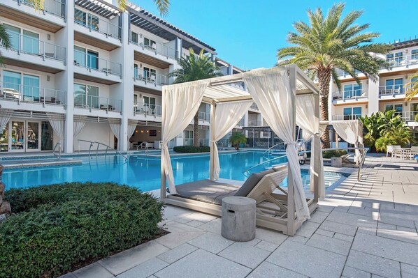 Relax in the cozy pool side cabanas!