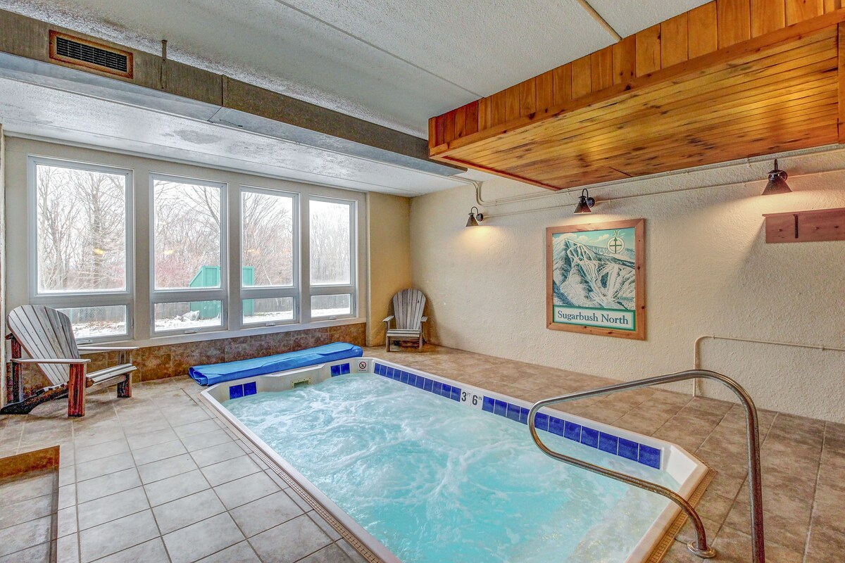 Ski-in/out condo with pool, hot tub, game room, mountain view, & fireplace