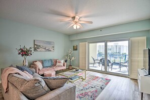 Living Room | Balcony Access | Single-Story Unit | 4th-Floor Condo