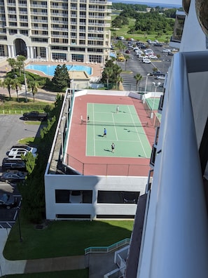 tennis courts atop parking garage