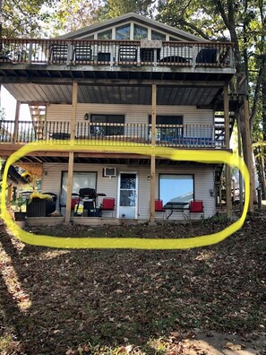 The apartment is on the lower level of the lake house.