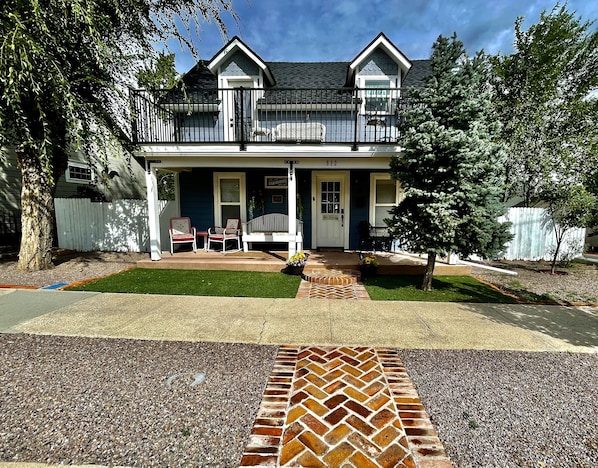 Follow the RED BRICK road to this adorable, fully remodeled 1914 FARMHOUSE. 