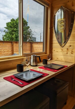 The dining area is a perfect place to enjoy the view of the farm