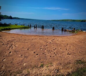 Private beach with paddle boat, kayaks, and dock available upon request. 