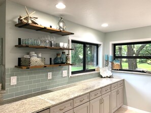 Nice view of the large backyard from the 2 kitchen windows.