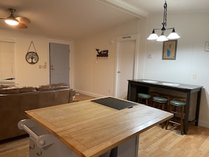 Kitchen table & six stools.