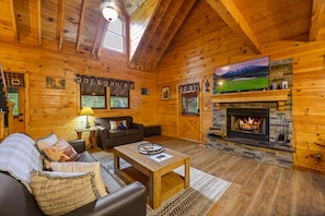 The warm, open living room of Rocky Top Retreat!