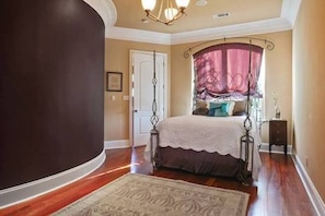 Master bedroom with private bathroom on second floor.