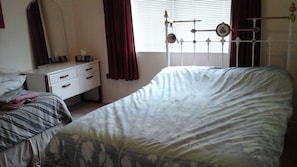 second bedroom with double and single bed