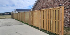 Our new fence along our driveway