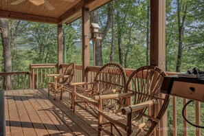 Relax and enjoy the fresh air on the covered porch