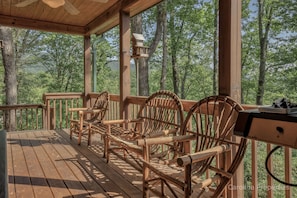 Relax and enjoy the fresh air on the covered porch