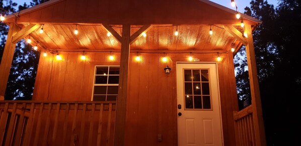 covered porch with lights