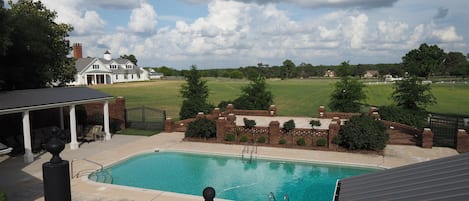 View off the upper back patio of the house. Over looks fields and more!