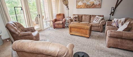 Relax in spacious living room with seating for 8!