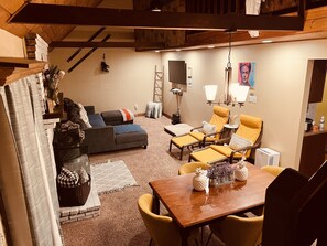 Living-room with 55" TV and Gas Fire place.