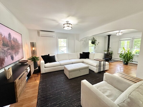 Living Area with 65" TV and generous seating