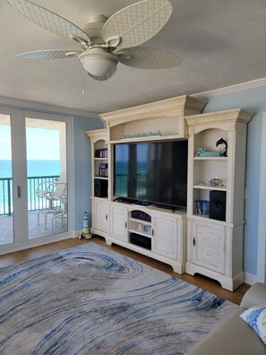 75 inch smart TV with surround sound.  Lots of games, Blu-ray player and movies.