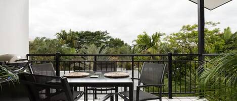 A relaxing outdoor dining area with Barbecue