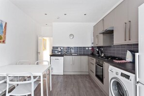 Kitchen with dining table and chairs