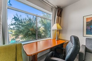 Beautiful Marriott Executive Desk Desk with affixed light, premium chair.