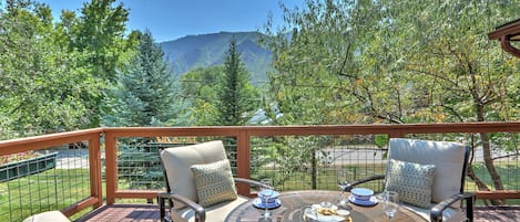 Outdoor seating area with mountain views