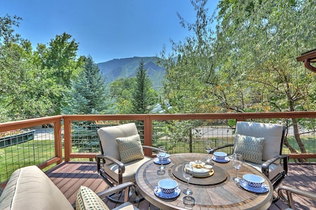 Outdoor seating area with mountain views