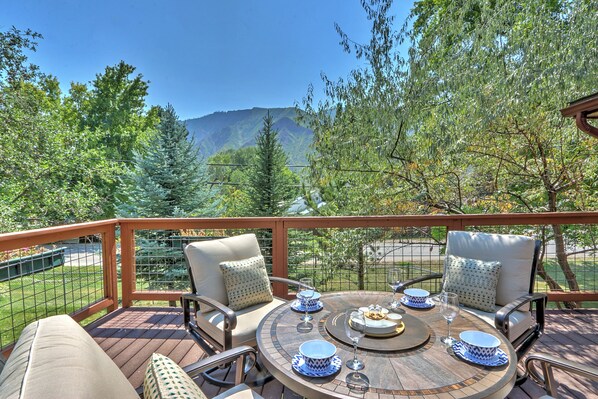 Outdoor seating area with mountain views