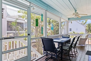 Serene screened-in patio for guests who enjoy to be outside