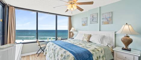 king bed with beach & pool views