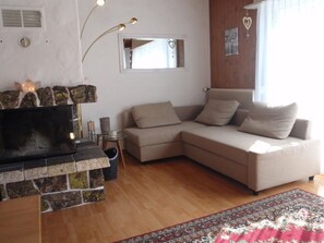 Brown, Couch, Property, Furniture, Wood, Lighting, Interior Design, Floor, Window, Living Room