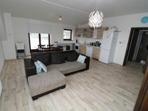 Couch, Picture Frame, Wood, Building, Living Room, Lighting, Flooring, Interior Design, Floor