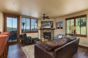 Ski-in/ski-out condo at Purgatory Resort in Durango, CO.

Living room with gas fireplace, TV, and mountain views. Queen pull out sofa. Access to outdoor patio. Great views of the slopes and mountains.