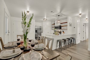 Open concept kitchen and dining.