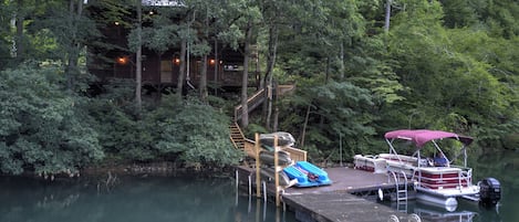 Private Dock with Pontoon Boat, kayaks, and swimming platform