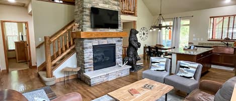 Living room- vaulted ceilings, new 50" smart TV,  gas fireplace 