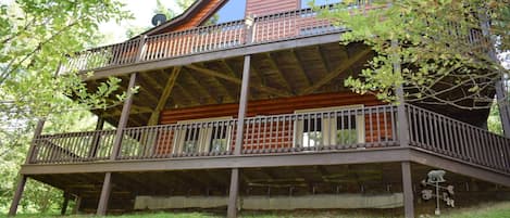 3 Story cabin that includes bedrooms in the loft, master and downstairs. 