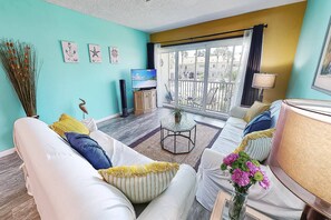 The newly decorated and freshly painted living room.  Floors are brand new!