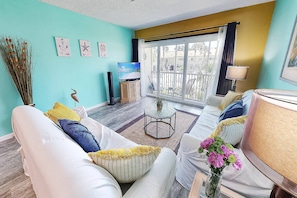 The newly decorated and freshly painted living room.  Floors are brand new!