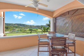 Terrace with a golf course view.