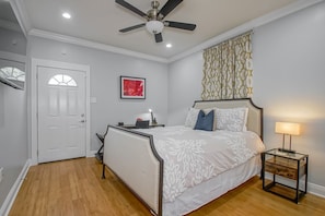 master queen bedroom leading to private beautiful backyard, in suite bathroom